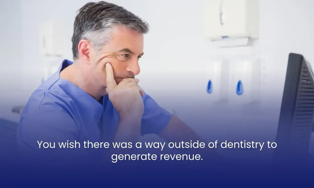 Dentist in scrubs looking thoughtfully at a computer screen with text overlay about generating revenue outside dentistry.